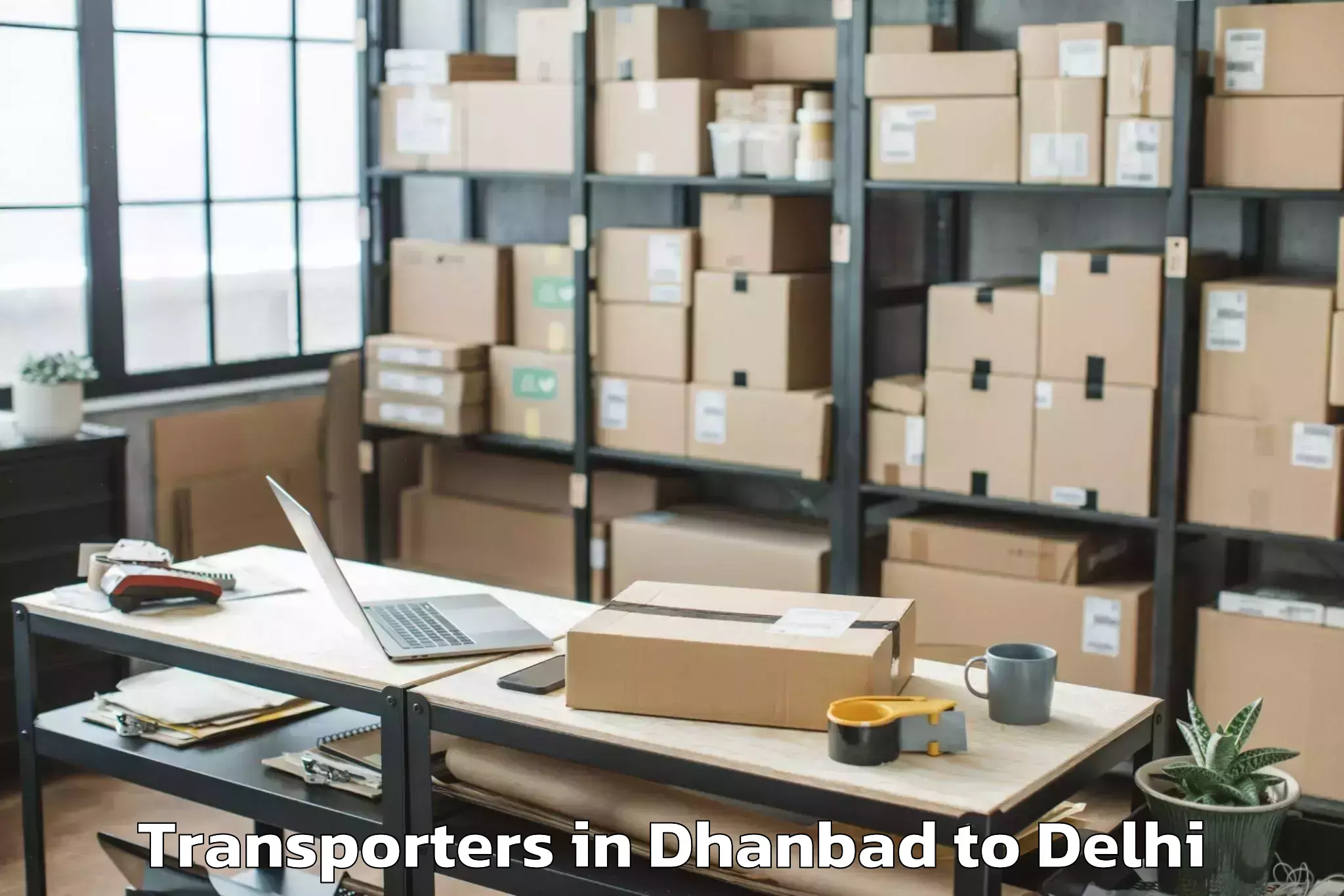 Get Dhanbad to Unity One Mall Rohini Transporters